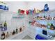Spacious pantry with wire shelving, stocked with ample goods and supplies for an organized kitchen at 4190 Bull St, St Cloud, FL 34772