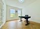 Versatile office space with ample natural light and wood floors at 5019 Down Ct, St Cloud, FL 34772