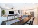 Open concept living space, flowing to the dining room, kitchen and stairs at 5414 Log Grove Ln, Orlando, FL 32829