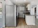 This home features stainless steel appliances and granite countertops in the kitchen at 5464 Windridge Ln, Orlando, FL 32810