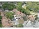 Aerial view of townhomes with mature trees and dedicated parking at 554 Northbridge Dr, Altamonte Springs, FL 32714