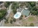 Aerial view of neighborhood amenities; pool, clubhouse, and tennis courts at 554 Northbridge Dr, Altamonte Springs, FL 32714