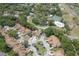 Aerial view of a neighborhood with community pool and tennis courts at 554 Northbridge Dr, Altamonte Springs, FL 32714