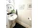 Bathroom with pedestal sink, decor accents, and modern design at 554 Northbridge Dr, Altamonte Springs, FL 32714