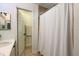 Clean bathroom with tan tiled shower and decorative mirror at 554 Northbridge Dr, Altamonte Springs, FL 32714