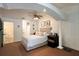 Bedroom featuring a ceiling fan, ensuite bath, and stylish decor at 554 Northbridge Dr, Altamonte Springs, FL 32714