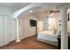 Well-lit bedroom with a column, closet, and doorway leading to the bathroom at 554 Northbridge Dr, Altamonte Springs, FL 32714