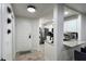 Entryway with a view to the kitchen with marble countertops and stainless-steel appliances at 554 Northbridge Dr, Altamonte Springs, FL 32714