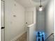 White hallway and stairway featuring a light fixture at 554 Northbridge Dr, Altamonte Springs, FL 32714