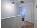 Bright hallway featuring a light fixture, tiled floor, and doorway leading to another room at 554 Northbridge Dr, Altamonte Springs, FL 32714