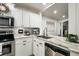 Bright kitchen features granite countertops and stainless steel appliances at 554 Northbridge Dr, Altamonte Springs, FL 32714