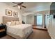Spacious main bedroom features neutral tones, tray ceiling and a cozy sitting area at 554 Northbridge Dr, Altamonte Springs, FL 32714