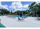 This community pool is surrounded by lounge chairs and tables at 554 Northbridge Dr, Altamonte Springs, FL 32714