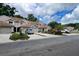 A street view of townhomes with driveways and parked cars at 554 Northbridge Dr, Altamonte Springs, FL 32714