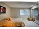 A well-lit bedroom with closet and window, offering a peaceful retreat at 6040 Peregrine Ave # A01, Orlando, FL 32819