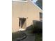 Front entrance of home featuring neutral siding and the house number at 6040 Peregrine Ave # A01, Orlando, FL 32819