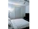 Cozy bedroom with a comfortable bed, soft lighting, and a relaxing atmosphere at 6141 Metrowest Blvd # 303, Orlando, FL 32835