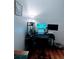 Home office setup with a modern desk, dual monitors, and ample natural light at 6141 Metrowest Blvd # 303, Orlando, FL 32835