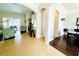 Light filled open living area with tile and wood floors, and views of the patio at 618 N Hampton Dr, Davenport, FL 33897