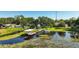 An aerial shot showcasing a private dock and boatlift on the waterway at 6200 Alligator Lake E Shr, St Cloud, FL 34771