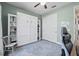 This bedroom features a Murphy bed, closet and an area rug at 6200 Alligator Lake E Shr, St Cloud, FL 34771