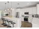 Well-appointed kitchen featuring a large island, stainless steel appliances, and open layout to the dining area at 6200 Alligator Lake E Shr, St Cloud, FL 34771