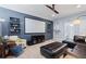 Cozy living room featuring a large screen, comfortable seating, and stylish decor for entertainment and relaxation at 6200 Alligator Lake E Shr, St Cloud, FL 34771