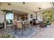 Enjoy outdoor dining and relaxing in this spacious screened patio area at 6200 Alligator Lake E Shr, St Cloud, FL 34771