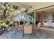 This screened patio includes a dining area and opens to the living room at 6200 Alligator Lake E Shr, St Cloud, FL 34771