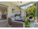 Relax on this screened patio with comfortable seating and lush greenery at 6200 Alligator Lake E Shr, St Cloud, FL 34771