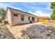 Spacious backyard with a concrete patio, ready for outdoor living and entertainment at 6593 Meritmoor Cir, Orlando, FL 32818