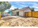 Backyard with a concrete patio and a wooden fence surrounding the yard at 6593 Meritmoor Cir, Orlando, FL 32818