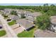 Overhead view featuring homes with well-kept lawns in a lush landscape at 6632 Pasturelands Pl, Winter Garden, FL 34787