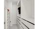 Walk-in closet with custom shelving and ample storage space at 6632 Pasturelands Pl, Winter Garden, FL 34787