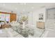Open-concept living and dining area with bright tile flooring and contemporary decor creates a spacious feel at 6632 Pasturelands Pl, Winter Garden, FL 34787