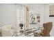 Bright office with modern glass desk, and ample natural light at 6632 Pasturelands Pl, Winter Garden, FL 34787