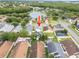 Aerial view of the neighborhood, backing up to a pond at 6714 Bouganvillea Crescent Dr, Orlando, FL 32809