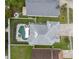 Overhead view of backyard pool with screen at 6714 Bouganvillea Crescent Dr, Orlando, FL 32809