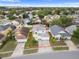 Aerial shot of home with long driveway and yard at 6714 Bouganvillea Crescent Dr, Orlando, FL 32809