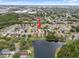Aerial view of the neighborhood highlighting the property's proximity to local amenities at 6714 Bouganvillea Crescent Dr, Orlando, FL 32809