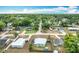 Aerial view of a neighborhood with single Gathering homes and lush landscaping at 690 W Pearl St, Bartow, FL 33830