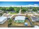 High angle aerial view of the property showing the house, backyard, and surrounding neighborhood at 690 W Pearl St, Bartow, FL 33830