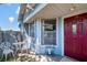Cozy front porch with seating area, perfect for relaxing and enjoying the neighborhood views at 7218 Alston Ct, Orlando, FL 32835