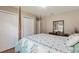 Bedroom featuring closet and floral comforter at 801 Ashton Dr, Davenport, FL 33837