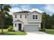 Charming two-story home featuring a modern design, two-car garage, and beautifully landscaped yard at 824 Lake Dell Rd, Dundee, FL 33838