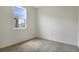 Bedroom featuring a window and plush carpeting at 832 Lake Dell Rd, Dundee, FL 33838