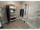 Spacious walk-in closet with custom shelving for optimal storage at 9803 Sweetleaf St, Orlando, FL 32827