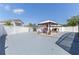 Spacious backyard features a patio area with gazebo and white privacy fence at 121 Lochness Ln, Kissimmee, FL 34743