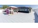 Spacious backyard featuring a covered patio and screened pool at 121 Lochness Ln, Kissimmee, FL 34743