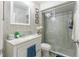 Bright bathroom featuring a sink, toilet and shower at 121 Lochness Ln, Kissimmee, FL 34743